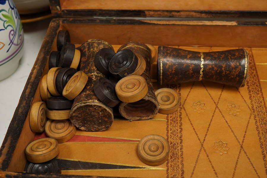 Three late 19th/early 20th century folding chess/backgammon boards fashioned as books